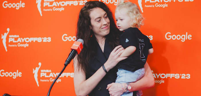 Breanna Stewart holds her first child Ruby after accepting the 2023 WNBA MVP Award